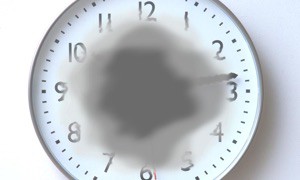Image of clock with gray blotch covering center